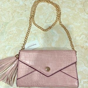 Francesca’s blush clutch